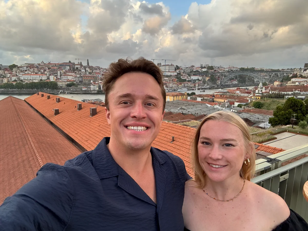 A travel selfie overlooking city rooftops